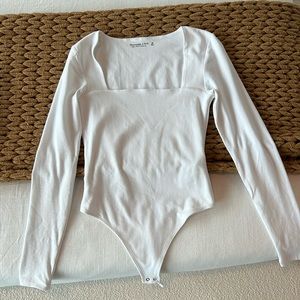 x small white body suit